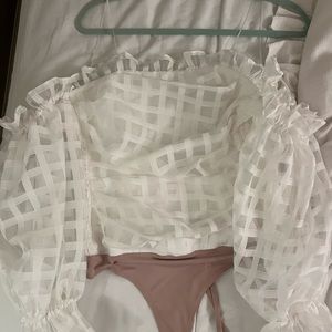 Amanda Uprichard puff sleeve body suit.